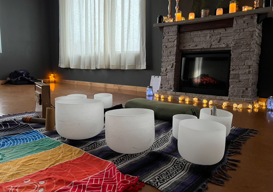 Accessories for yoga in a room with a fireplace