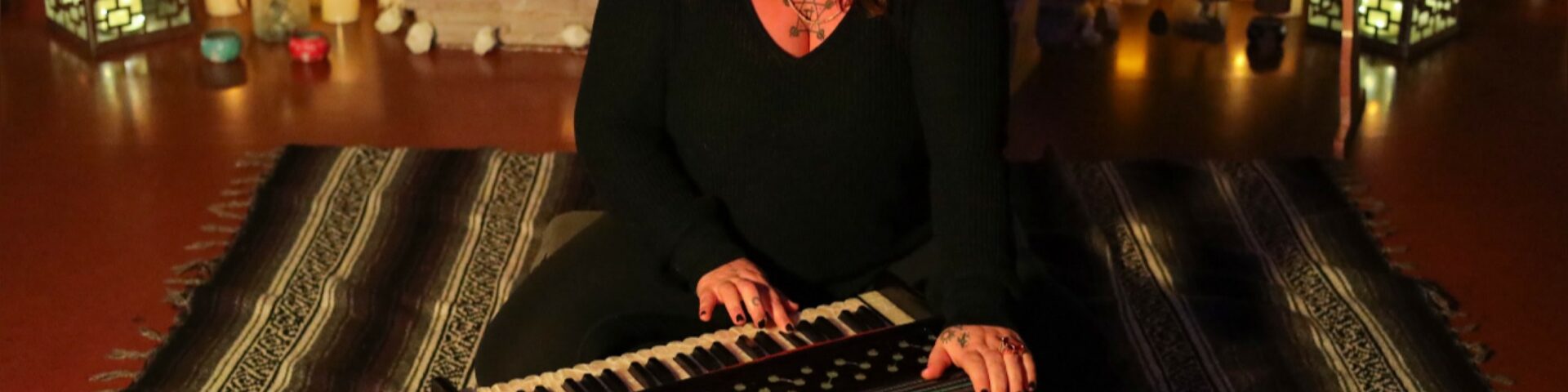 A woman plays an instrument
